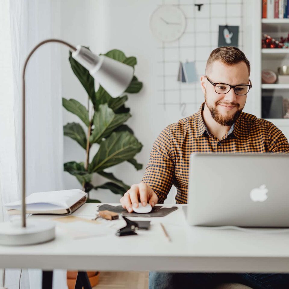 man using macbook