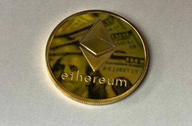 round gold colored ethereum ornament