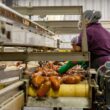 woman cleaning sweet potatoes